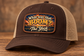 The Yock BOOM patch on a brown and khaki Richardson 112 hat — mockup