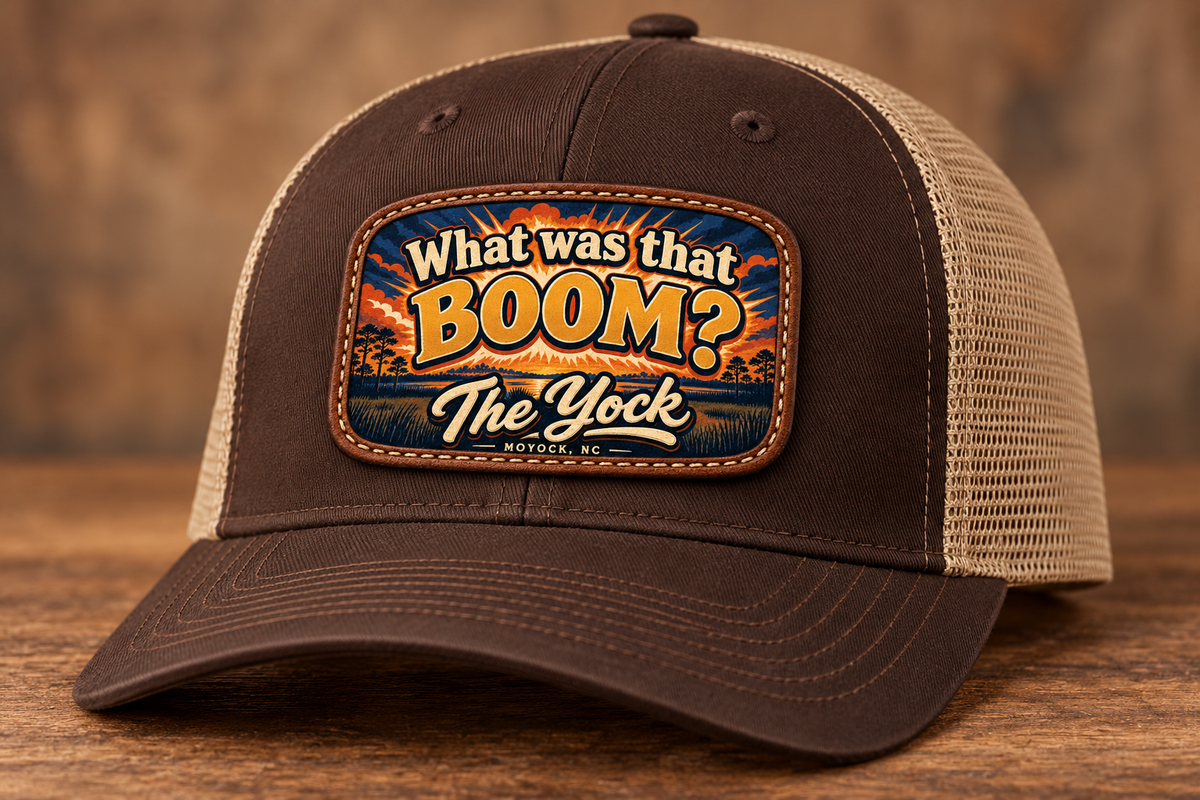 The Yock BOOM patch on a brown and khaki Richardson 112 hat — mockup